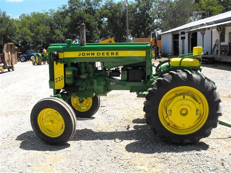 john deere 320 weight